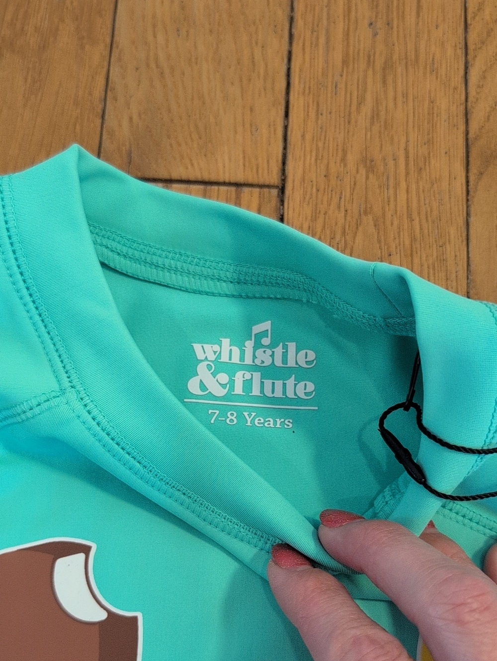 Whistle & Flute Rash Guard - Picture 4 of 5